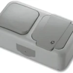 Вимикач з розеткою з накладною кришкою VIKO Palmiye 90555581 сіра